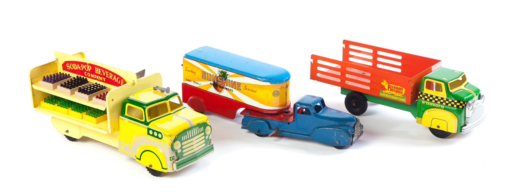 Appraisal: THREE TOY TRUCKS TWO OF WHICH ARE MARX American nd