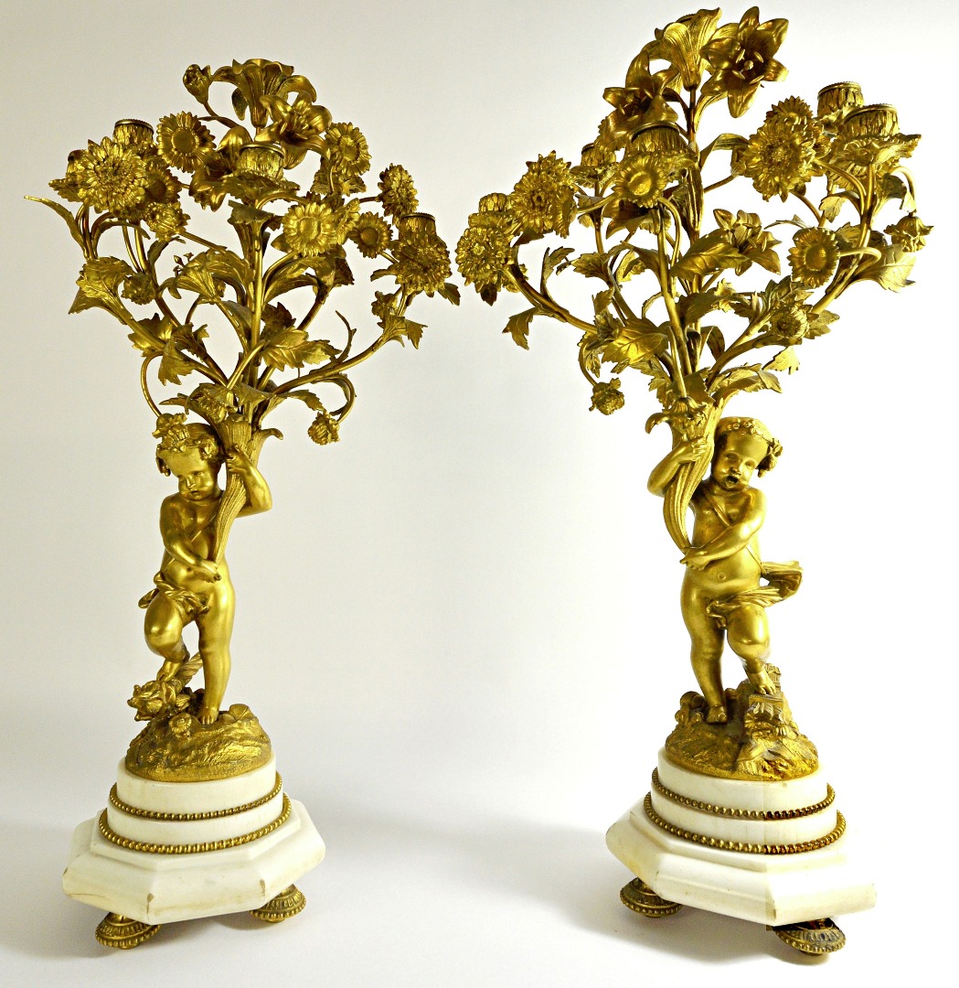 Appraisal: A pair of French ormolu six branch figural candelabra late