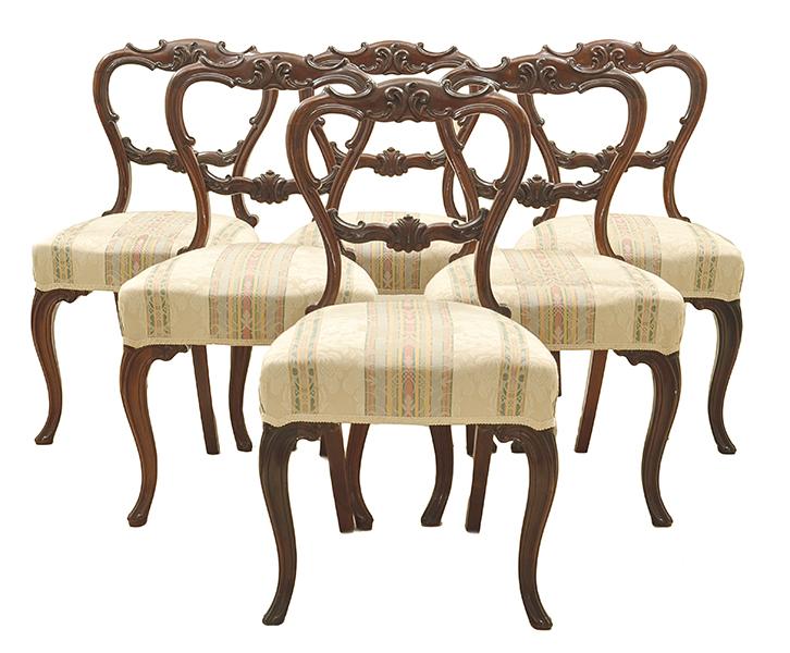 Appraisal: A SET OF SIX VICTORIAN ROSEWOOD DINING CHAIRS Each with