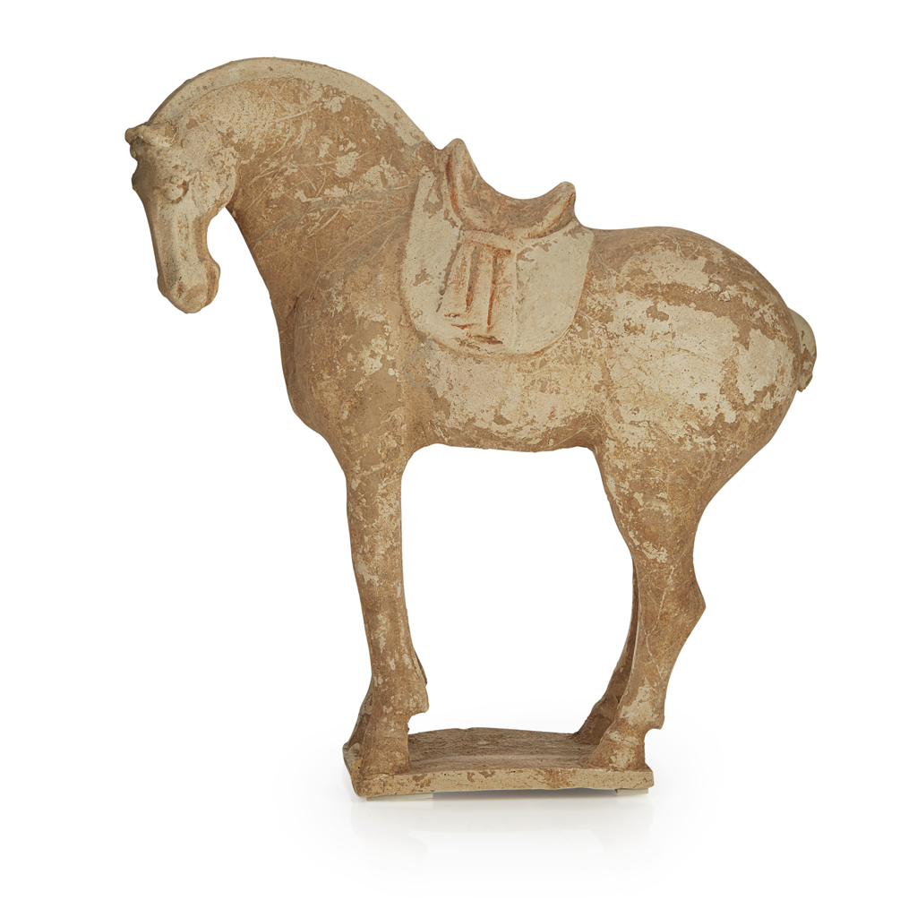 Appraisal: PAINTED POTTERY MODEL OF A HORSE the animal standing foursquare