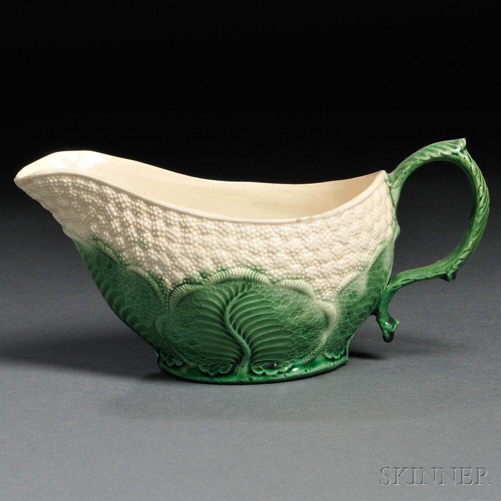 Appraisal: Staffordshire Cream-colored Earthenware Cauliflower Sauceboat England c molded and enameled