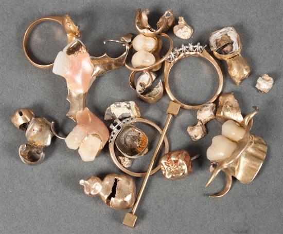 Appraisal: Group of gold plated teeth and other jewelry findings grams