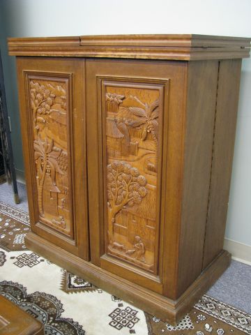 Appraisal: Vintage Oriental carved bar cabinet with hinged folding top revealing