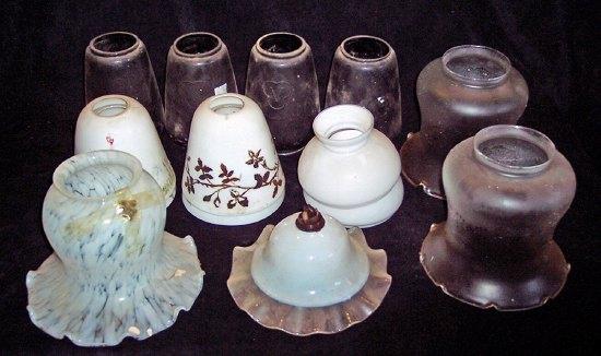 Appraisal: Four opaque white glass shades painted flowers and ten other