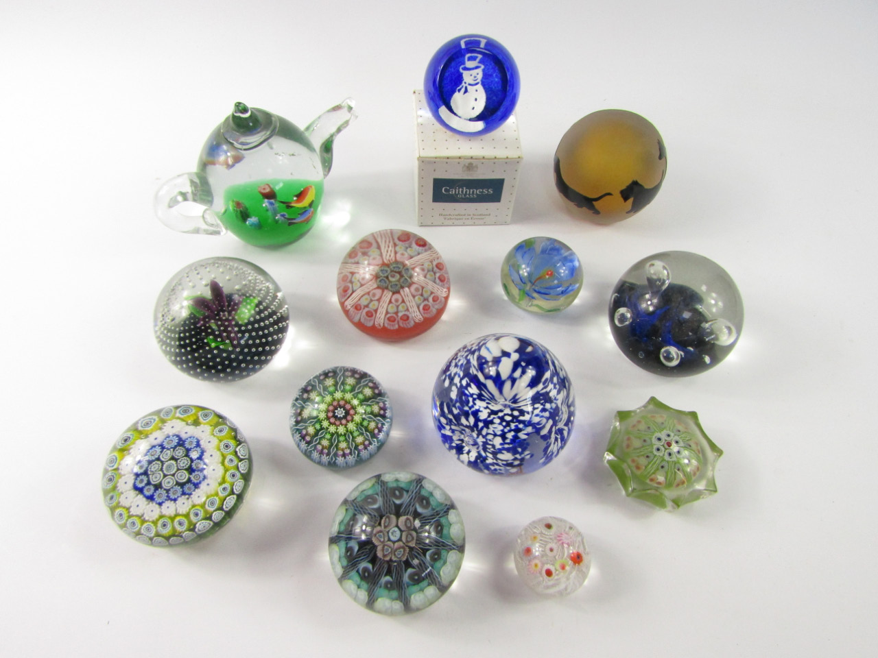 Appraisal: A group of Scottish millefiori and decorative glass paperweights including