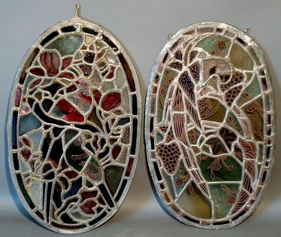 Appraisal: Pair of oval stained and leaded glass panels or windows