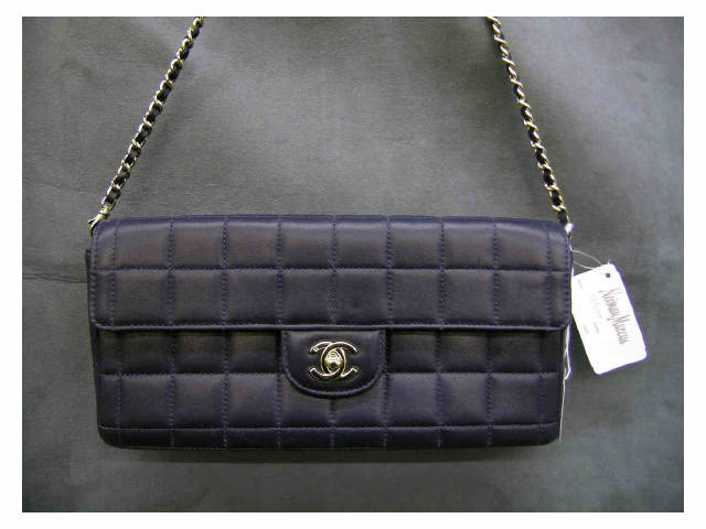 Appraisal: Chanel handbag quilted navy blue leather clutch new with tag