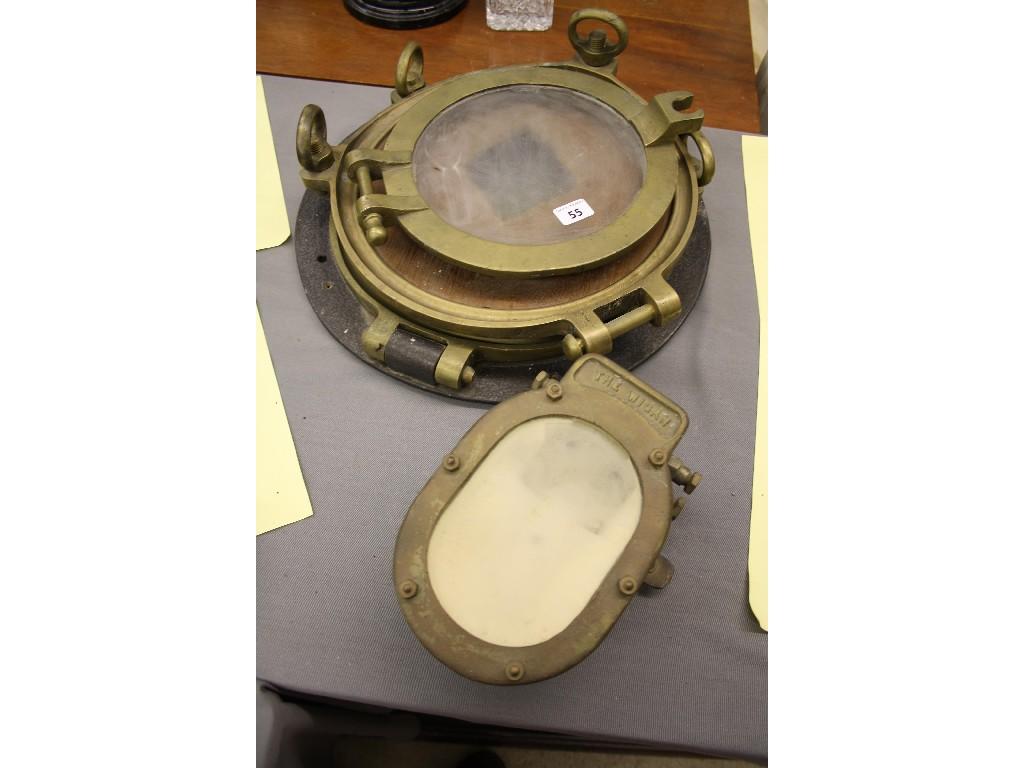 Appraisal: Two brass ship's portholes both inscribed J J Wood Rainhill