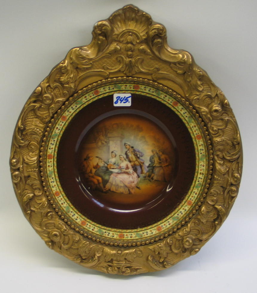 Appraisal: ROYAL VIENNA PORCELAIN PLATE depicting figures in Colonial costume with