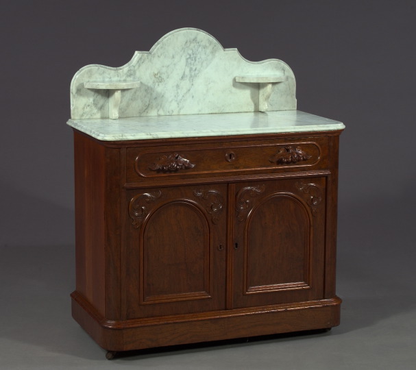 Appraisal: American Rococo Revival Plum Pudding Mahogany Marble-Top Washstand third quarter