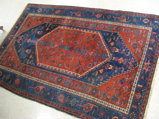 Appraisal: SEMI-ANTIQUE PERSIAN TRIBAL AREA RUG hand knotted in an overall