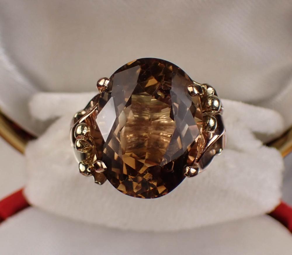 Appraisal: BI-COLOR TOPAZ AND FOURTEEN KARAT GOLD RING The k yellow