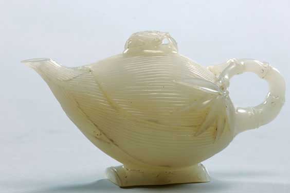 Appraisal: CARVED WHITE JADE TEAPOT Well carved Chinese white jade teapot