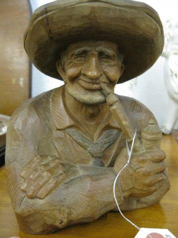 Appraisal: Carved Wooden Bust of German Man with pipe