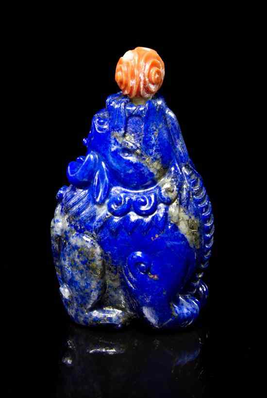 Appraisal: A Carved Lapis Lazuli Snuff Bottle depicting a Buddhistic lion