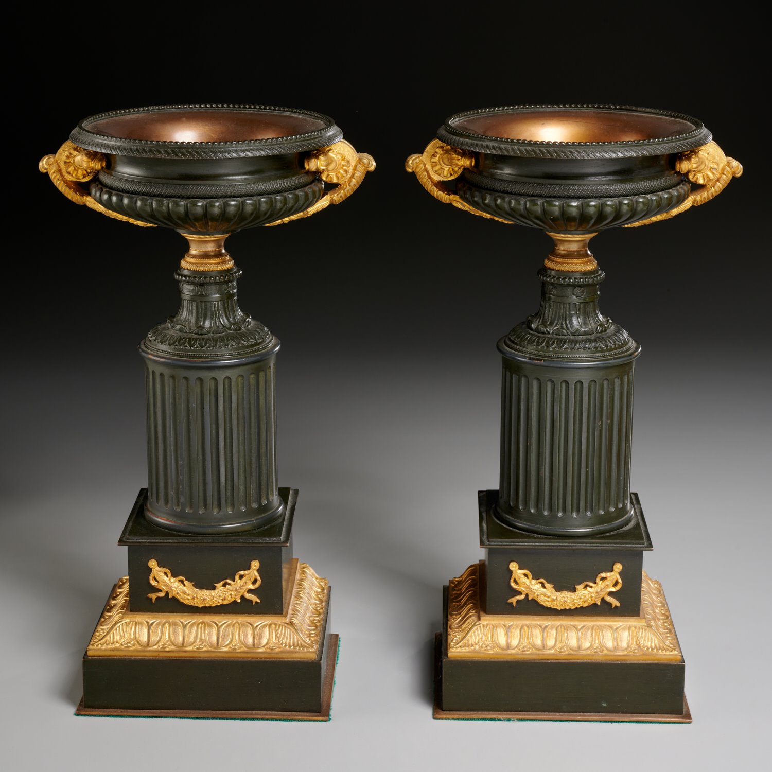 Appraisal: PAIR EMPIRE GILT AND PATINATED BRONZE URNS th c France