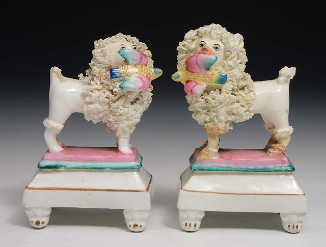 Appraisal: A pair of small English porcelain models of poodles th