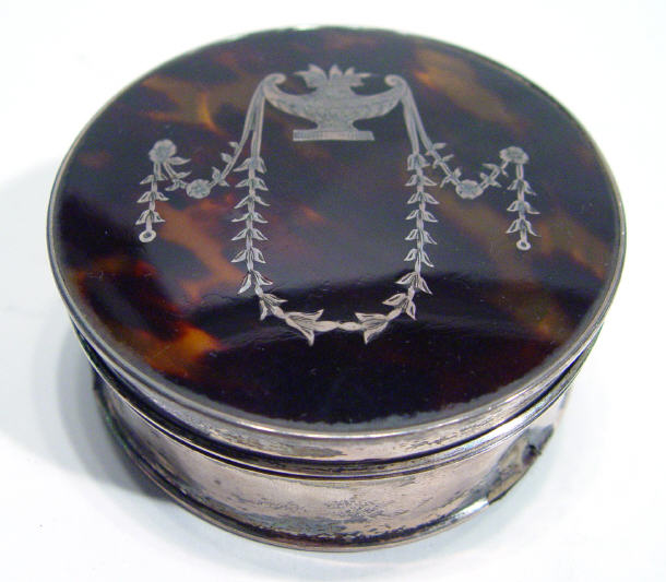 Appraisal: Edwardian silver and tortoiseshell circular box the lid inlaid with