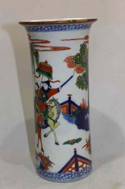 Appraisal: A CHINESE POLYCHROME CYLINDRICAL VASE with figures looking looking out