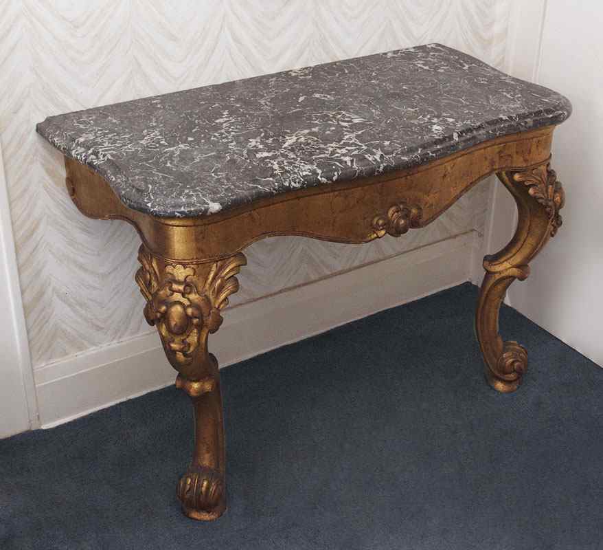 Appraisal: GILT CARVED MARBLE TOP HALF TABLE Grey marble top over