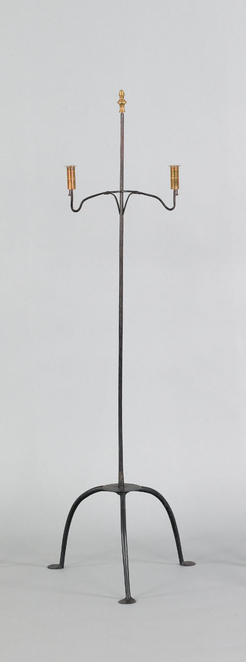 Appraisal: Wrought iron floor standing candleholder th c the adjustable arm