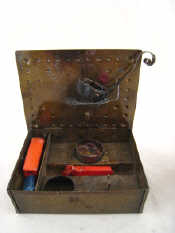 Appraisal: A steel sealing wax kit complete with wax and ladle