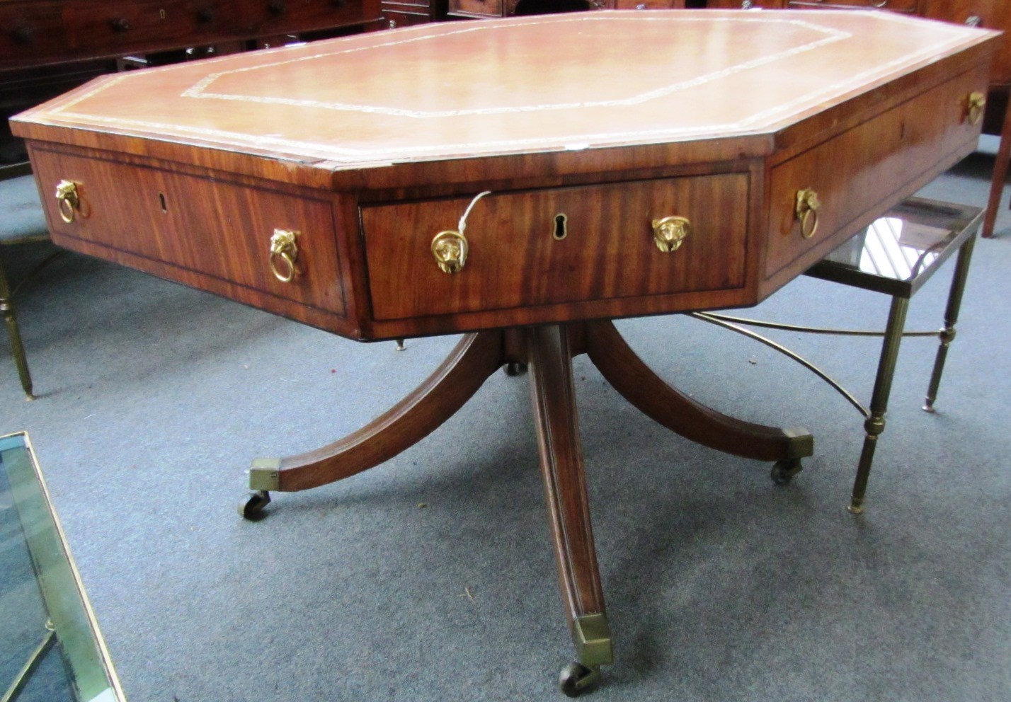 Appraisal: A made up George III style drum table the compressed