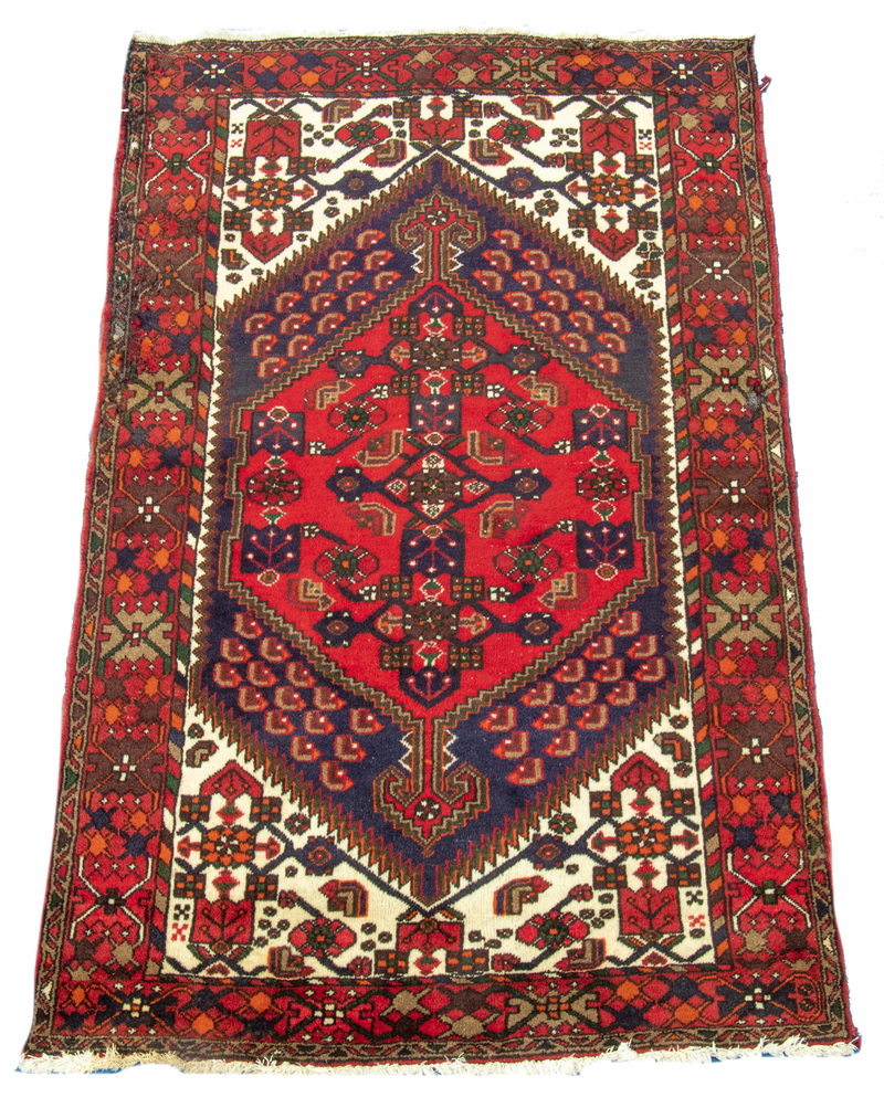 Appraisal: HAMADAN RUG A large notched hexagonal medallion in red and