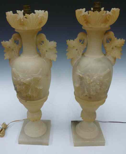 Appraisal: A PAIR OF LARGE ALABASTER TABLE LAMPS of urn form