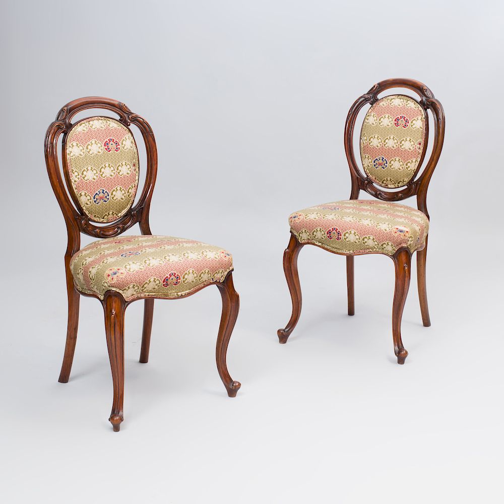 Appraisal: Pair of Victorian Carved Walnut Side Chairs x x in