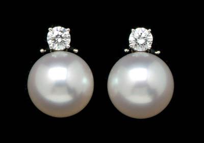 Appraisal: Pair Tiffany pearl ear clips each set with one fine