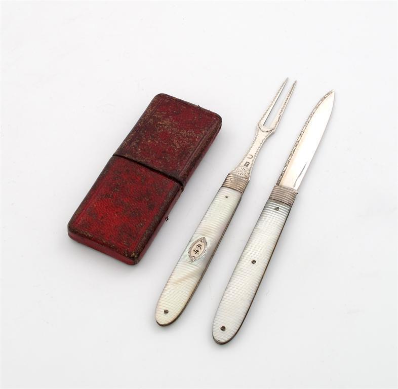 Appraisal: A Georgian silver mounted folding fruit knife and fork