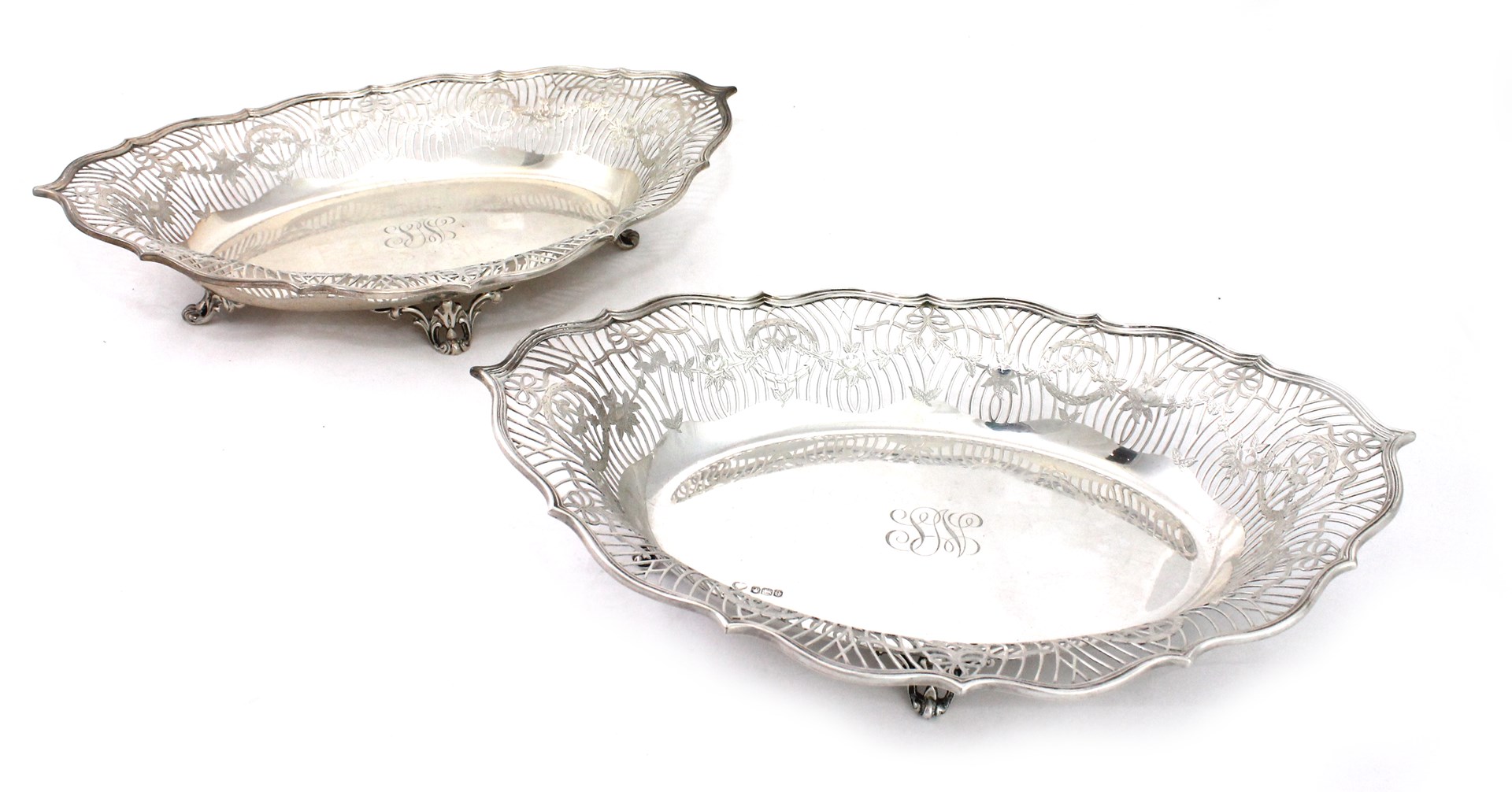 Appraisal: Two similar silver shaped oval baskets each with pierced and