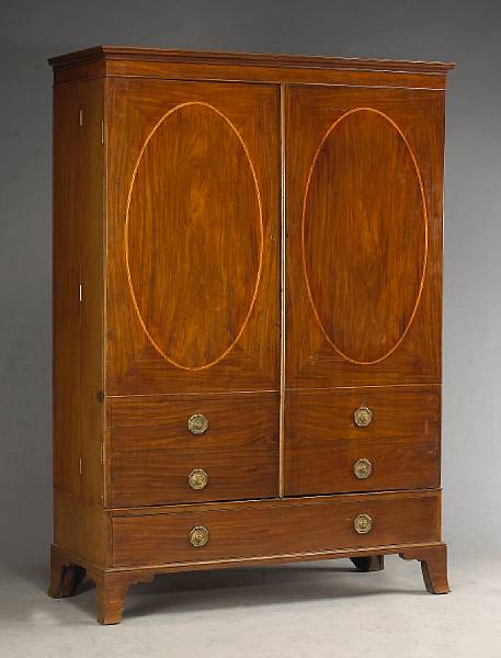 Appraisal: A George III style inlaid mahogany linen press late th