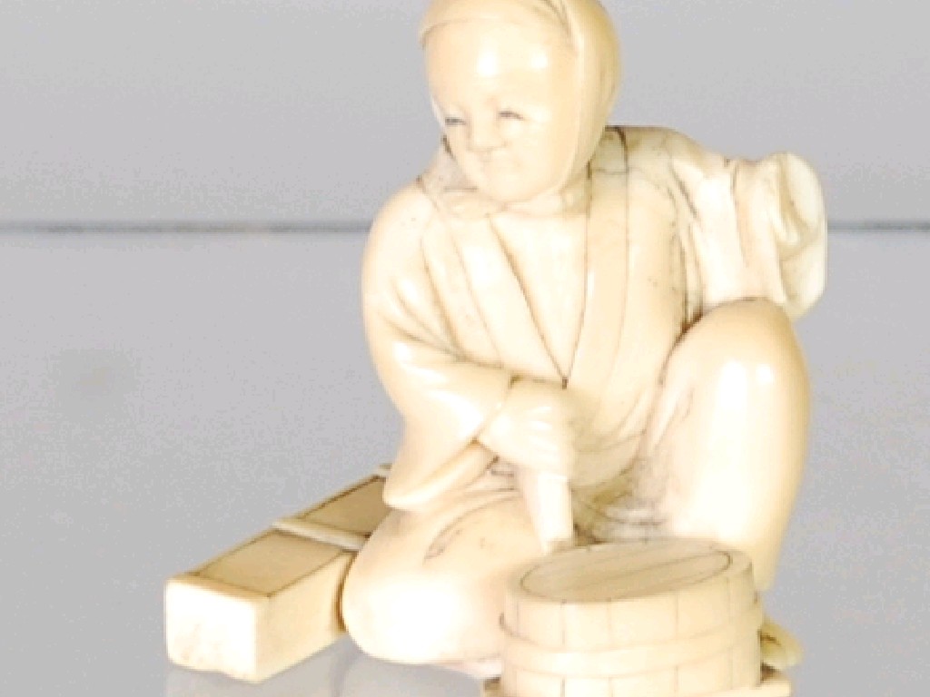 Appraisal: ORIENTAL CARVED IVORY OKIMONO of a man seated with two