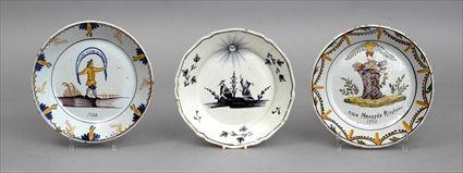 Appraisal: TWO FRENCH FAIENCE POLYCHROME DISHES AND A GRISAILLE DISH The