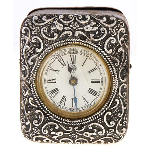 Appraisal: An Edwardian silver mounted leather covered travelling clockcase of bale