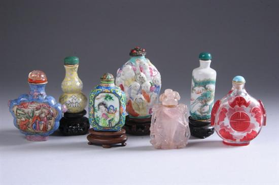 Appraisal: SEVEN CHINESE SNUFF BOTTLES Molded porcelain with ring handles and