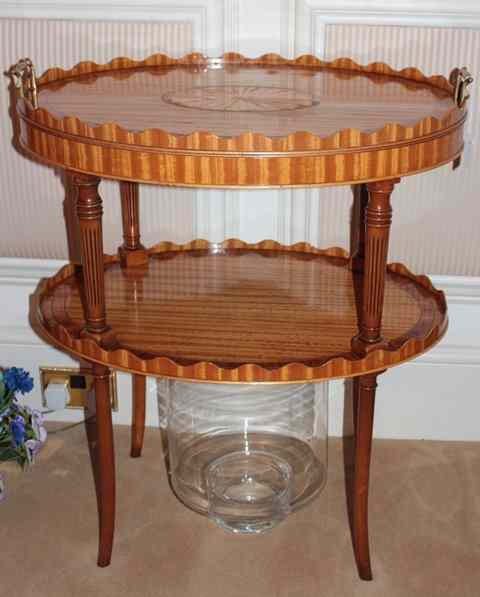 Appraisal: A GEORGE lll STYLE OVAL SATINWOOD TWO TIER OCCASIONAL TABLE