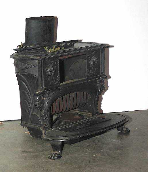 Appraisal: A Victorian cast iron fire place stove stamped Smith amp