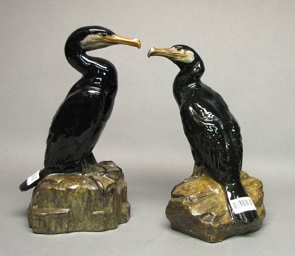 Appraisal: A pair of pottery models of cormorants Taisho Showa Period