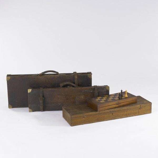 Appraisal: THREE RIFLE CASES Together with a wooden chess set x