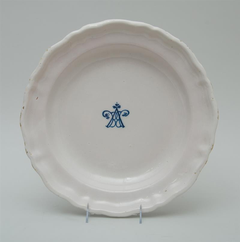 Appraisal: CONTINENTAL FAIENCE MONOGRAMMED PLATTER Unmarked of circular serpentine outline with