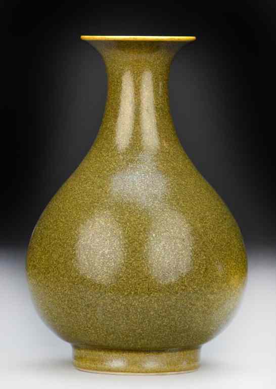 Appraisal: Chinese Tea Dust Porcelain VaseOf bottle form with flared rim