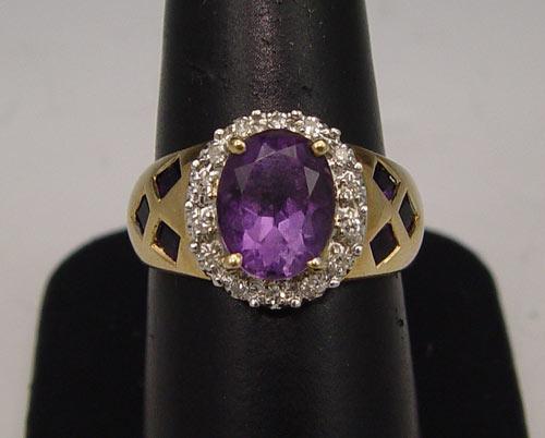 Appraisal: K AMETHYST DIAMOND RING K yellow gold ring centers one