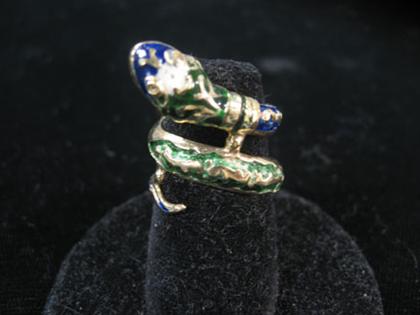 Appraisal: karat yellow gold and enamel snake ring Wrap around snake