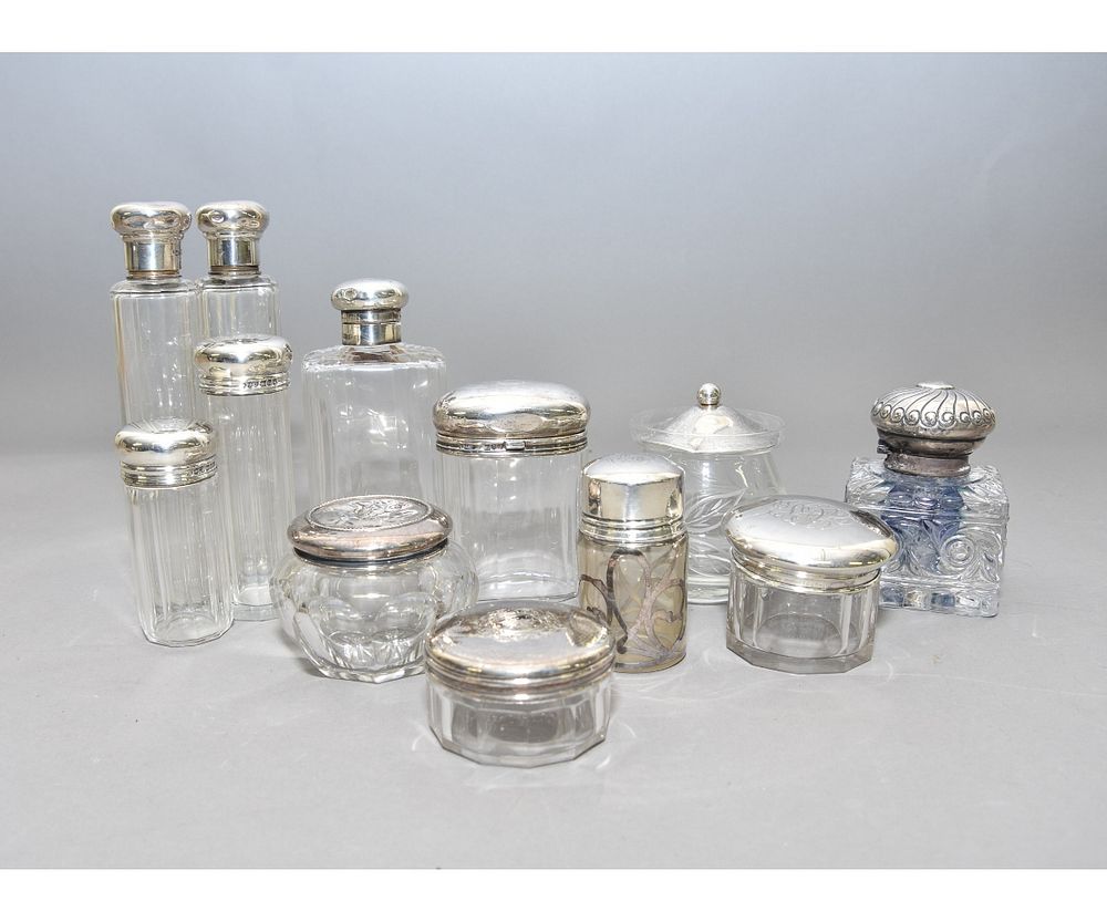 Appraisal: English and Sterling Silver Dresser Bottles etc Twelve English sterling