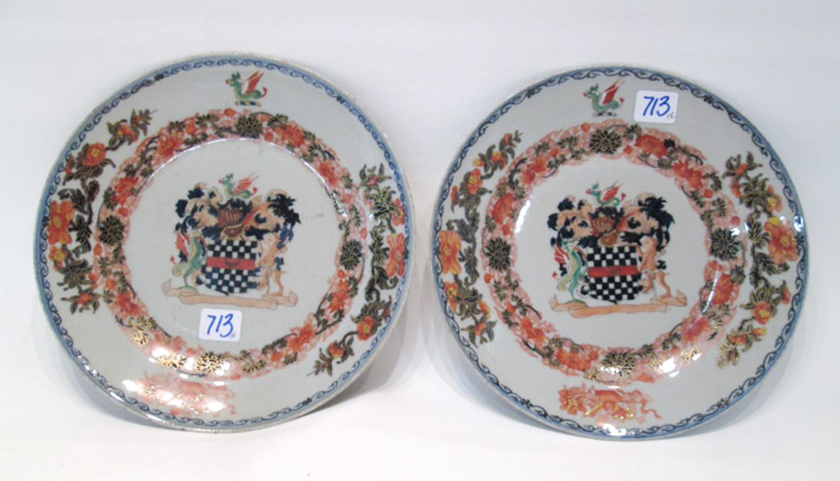 Appraisal: CHINESE EXPORT ARMORIAL PORCELAIN PLATES having Chinese floral painted border