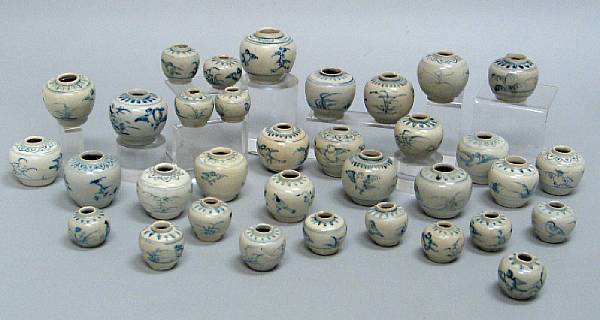 Appraisal: A group of thirty-four blue and white jarlets Late th