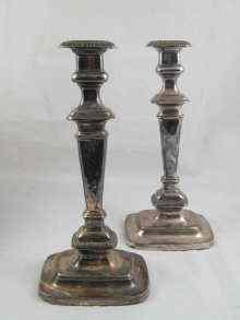 Appraisal: A pair of silver plate candlesticks circa approx cm high